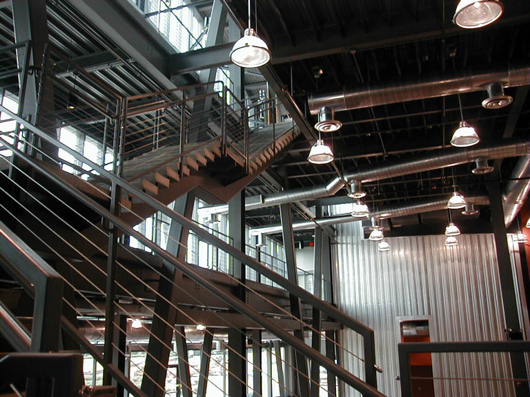 A metal staircase in an industrial building.